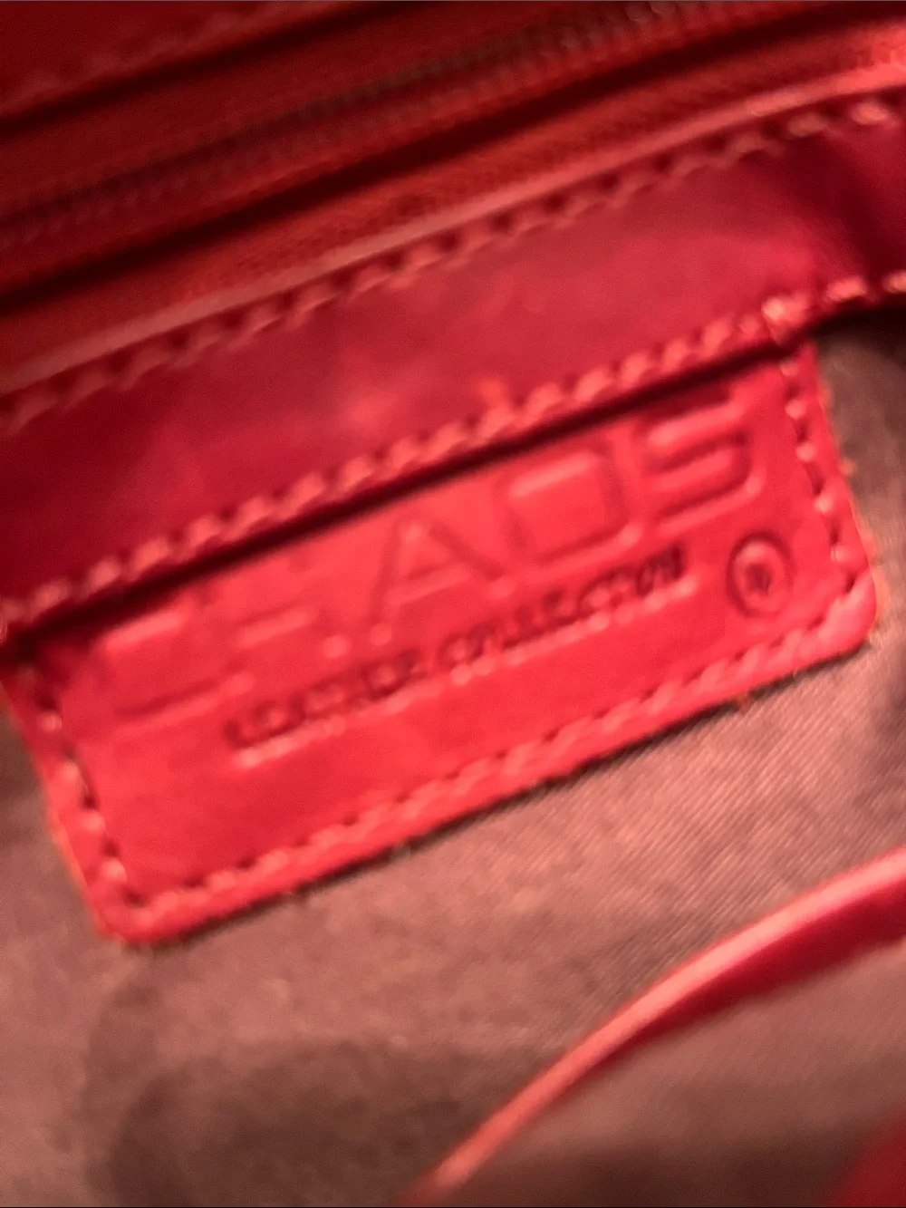 Chaos Red Leather Crossbody Laptop Bag - Sleek Women's Shoulder Bag. great shape